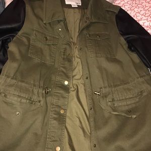 Beautiful olive green with faux leather sleeves